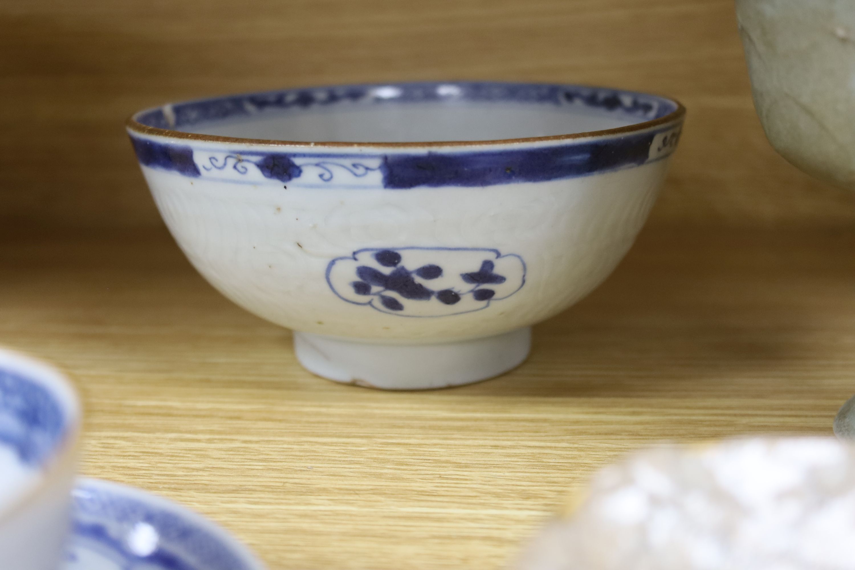 A Chinese blue and white bowl, diameter 15cm, a tea bowl and saucer, a crackleglaze shell dish and a celadon glazed stem cup